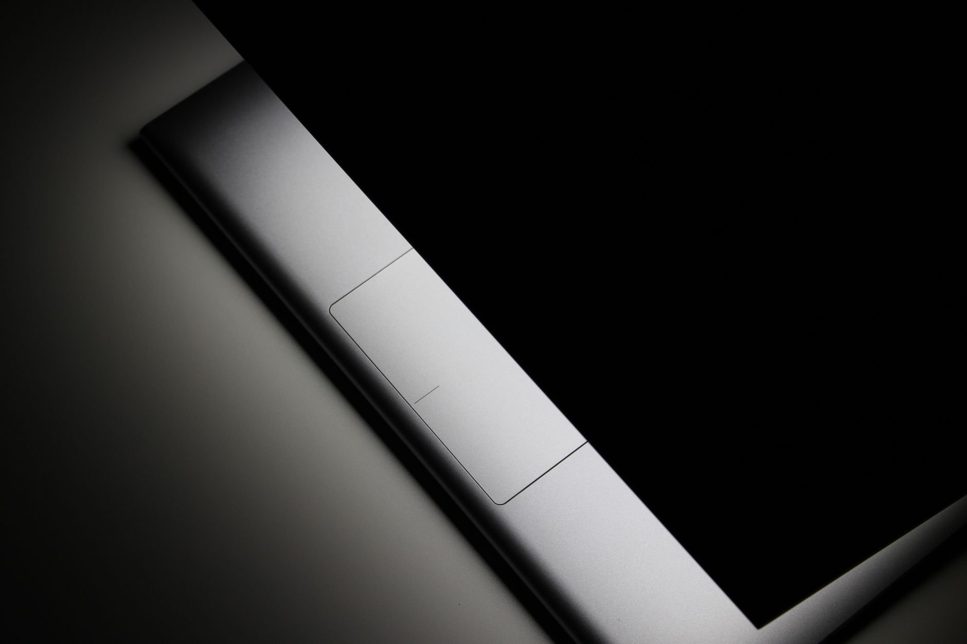 Sleek minimalist design work in a dark studio setting