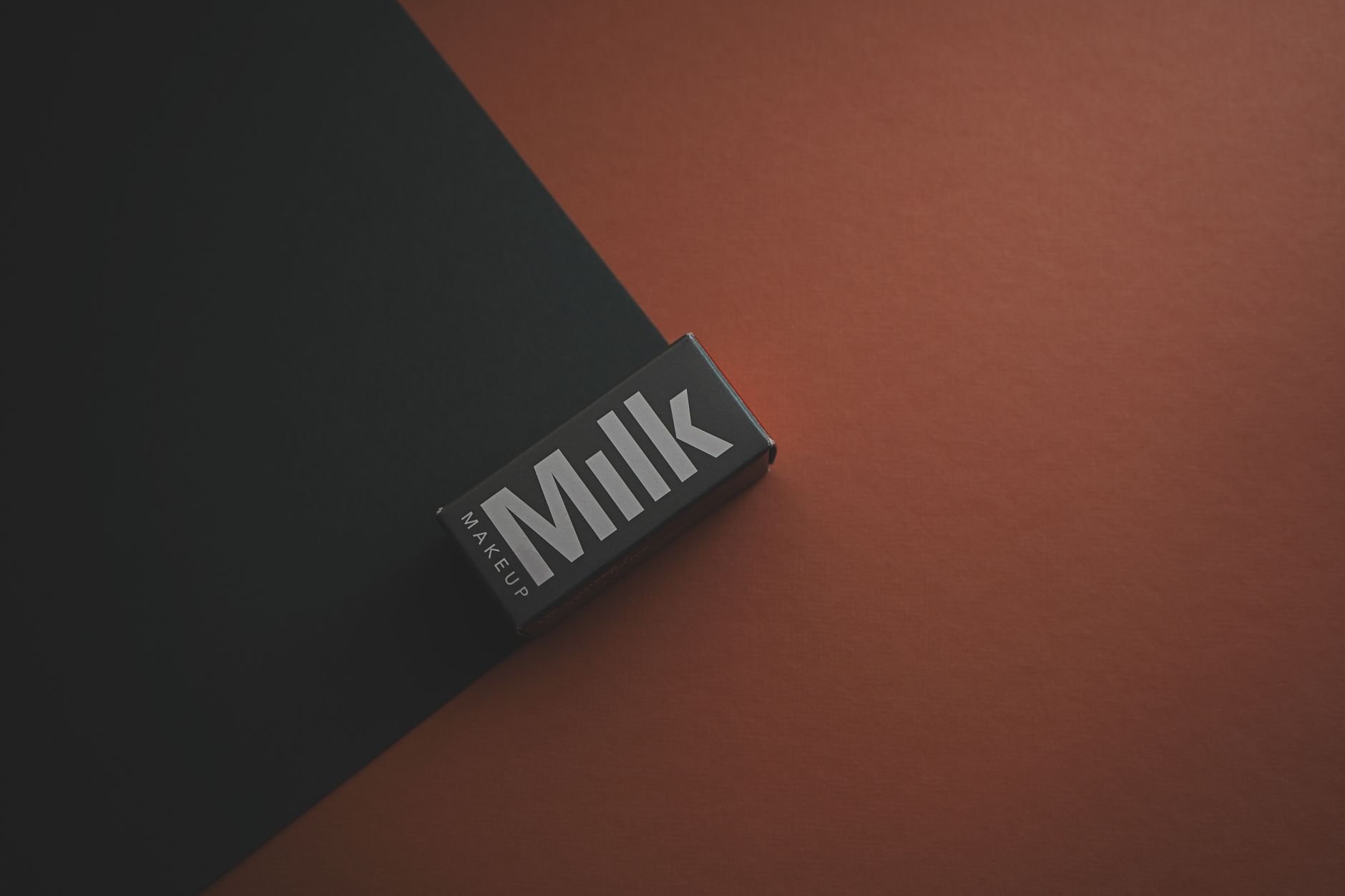 Minimalist premium product packaging design on dark background